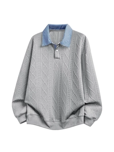 Men's grey cable-knit polo sweatshirt with classic blue plaid collar and button detail