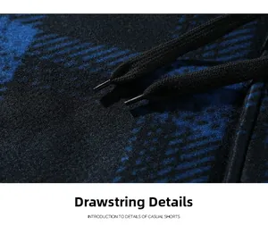 Macro shot of the black woven drawstring and textured knit fabric on casual shorts