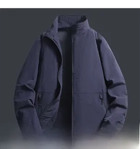 Detail showing breathable mesh lining and ribbed cuffs of this navy bomber jacket