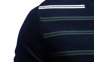 Macro detail of navy knitted cotton T-shirt featuring fine texture and striped shoulder seams