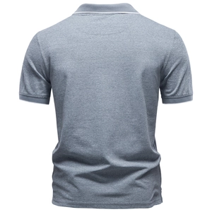 Rear view of heather grey men's short sleeve polo shirt with white trim on collar