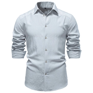 Detail view of breathable wrinkled fabric texture and classic collar on men's business shirt