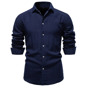 Detail of navy business shirt showing linen texture, lapel collar and size S tag