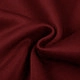 Macro shot of deep burgundy velvet fabric showing soft texture and luxury sheen