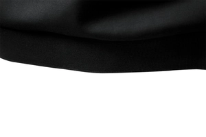 Detail shot of the ribbed cuff and knit texture on this premium black polo shirt
