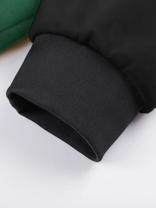 Detail of high-density ribbed cuff and reinforced stitching on outdoor jacket sleeve