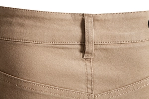 Detailed close-up of khaki cotton chino waistband featuring belt loops and double stitching