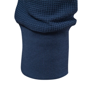 Men's navy waffle knit long sleeve T-shirt showing detailed ribbed cuffs and texture