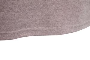 Macro view of grey-pink polo shirt hem with double-needle stitching and pique fabric texture