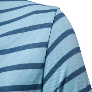 Men's light blue striped polo shirt detail with premium pique fabric and shoulder seam