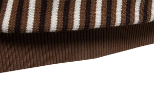 Macro view of brown striped knit fabric texture and ribbed hem on a men's polo shirt