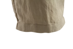 Macro shot of khaki business casual shorts showing twill cotton fabric and neat stitching