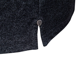 Men's business polo shirt featuring dark grey heather fabric and side vent with rivet