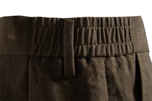Detail view of Lyocell cotton business shorts featuring elastic waistband and twill texture