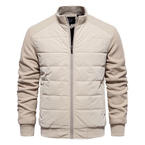 Men's light beige stand collar jacket with quilted body and honeycomb textured sleeves