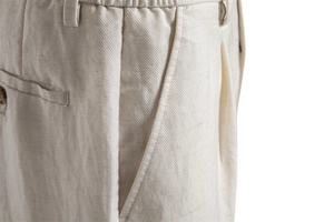 Detail view of lyocell cotton shorts showing elastic waist and fine twill fabric texture