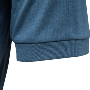 Men's V-neck cotton T-shirt featuring navy blue ribbed knit cuffs and detailed texture