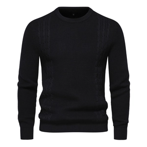 Men's black waffle knit sweater with crew neck and classic cable knit texture patterns