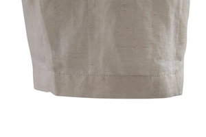 Close-up of high-quality stitching and breathable lyocell cotton fabric on men's shorts