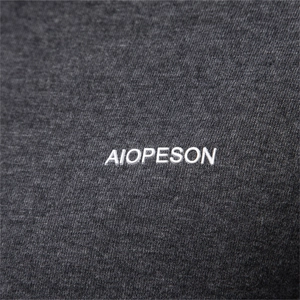 Men's dark heather grey knit top with a white embossed AIOPESON logo detail