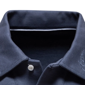 Classic dark blue polo shirt for men in breathable cotton pique fabric with collar embroidery