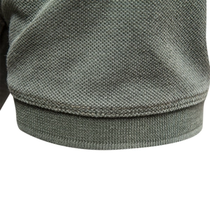 Men's greyish green cotton polo shirt featuring breathable pique fabric and ribbed texture
