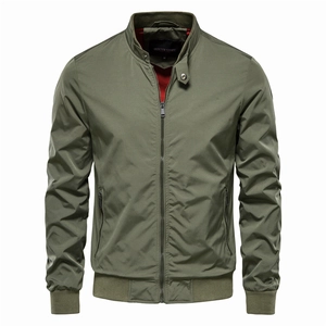 Men's olive green stand collar jacket with red lining and ribbed cuffs on white background