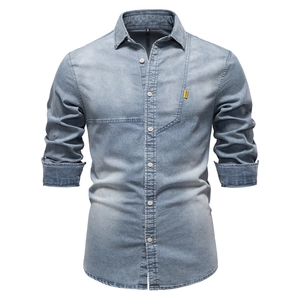 Men's light blue washed denim long sleeve shirt with fashion label and button collar