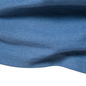 Men's blue waffle weave long sleeve Henley shirt featuring premium textured cotton fabric