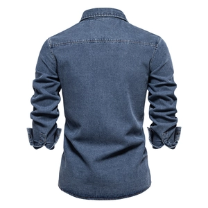 Rear view of a premium men's long sleeve dark blue washed denim shirt on white background