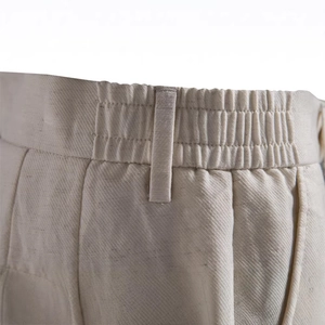 Men's business casual shorts in beige Lyocell cotton with elastic waistband and belt loops