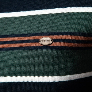 Men's quarter-zip striped sweater in dark green with a detailed metal brand emblem