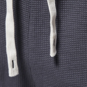 Men's dark grey athletic shorts with drawstring and waffle knit breathable fabric texture