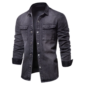 Men's vintage washed black denim jacket featuring dual chest pockets and snap buttons