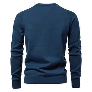Men's navy blue crewneck knit sweater with raglan sleeves and ribbed cuffs, back view