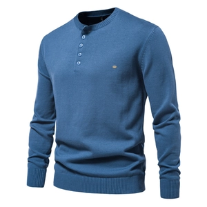 Men's blue long sleeve Henley neck knit sweater with ribbed cuffs and four button placket