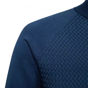 Men's navy blue cotton knit sweater featuring solid color raglan sleeve patchwork detail