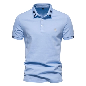 Light blue cotton Polo shirt with striped collar and silver lion embroidery details