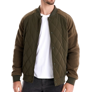 Men's olive green quilted bomber jacket with contrast sleeves and snap button closure