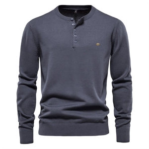 Men's dark blue-grey long sleeve Henley knit sweater with premium texture and logo detail