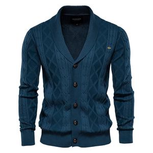 Men's navy blue cable knit cardigan with shawl collar and five brown buttons
