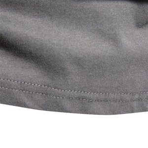 Close-up of gray cotton long-sleeve T-shirt featuring double-needle hem stitching detail