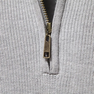 Men's light grey half-zip sweater with ribbed knit texture and stylish stand collar