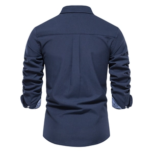 Navy blue long sleeve slim fit shirt for men featuring a back pleat and contrast cuff lining