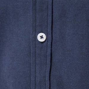 Slim fit navy blue long sleeve casual shirt in oxford fabric with white button detail