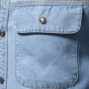 Classic men's light blue washed denim shirt with chest pocket and contrast stitching detail