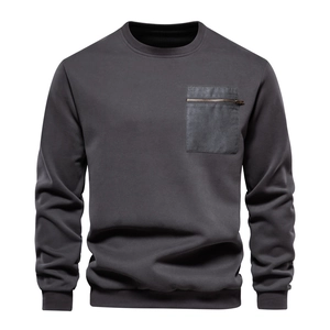 Men's solid dark grey crewneck sweatshirt with a functional metallic zipper chest pocket