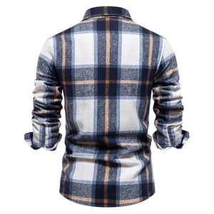 Back view of men's long-sleeve plaid shirt in navy and orange check pattern