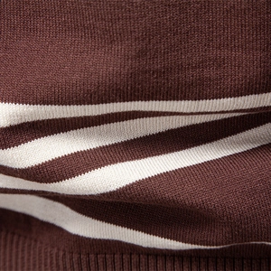 Men's half-zip polo sweater featuring brown and white stripes with ribbed knit texture