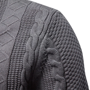 Men's grey knit cardigan featuring cable and honeycomb patterns with textured stitching